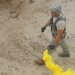 OSW cadre throws smoke grenade