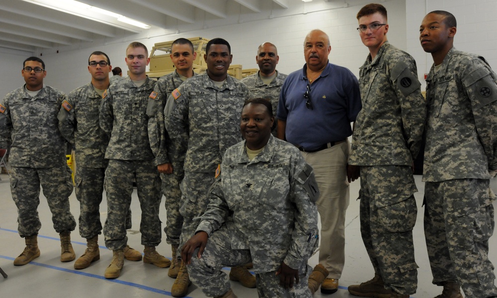 OSW Col. Junior and Commissioner Holliday pose with soldiers