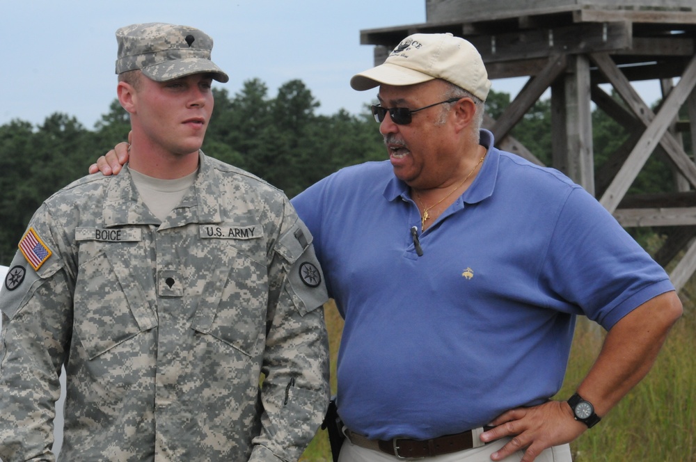 OSW Commissioner Holliday talks with soldier