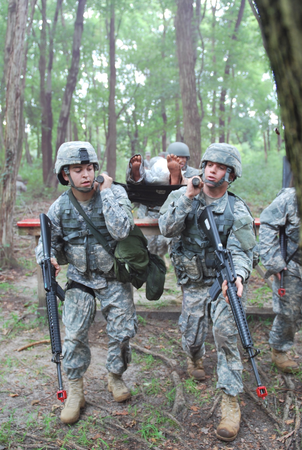 OSW soldiers carry litter