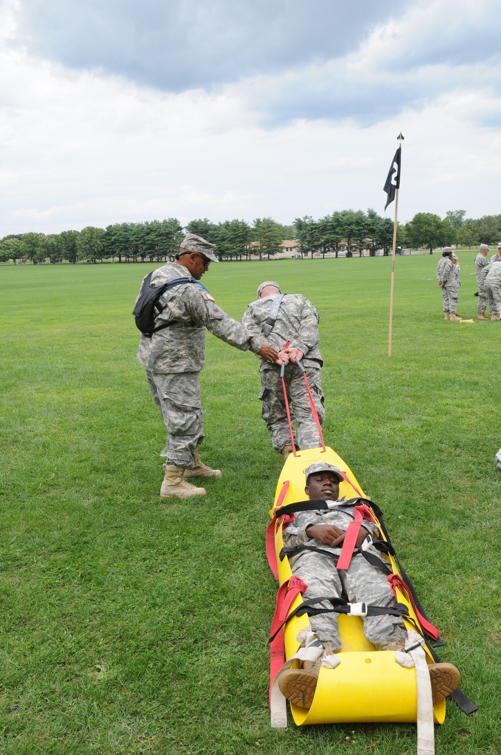 OSW soldiers drag litter