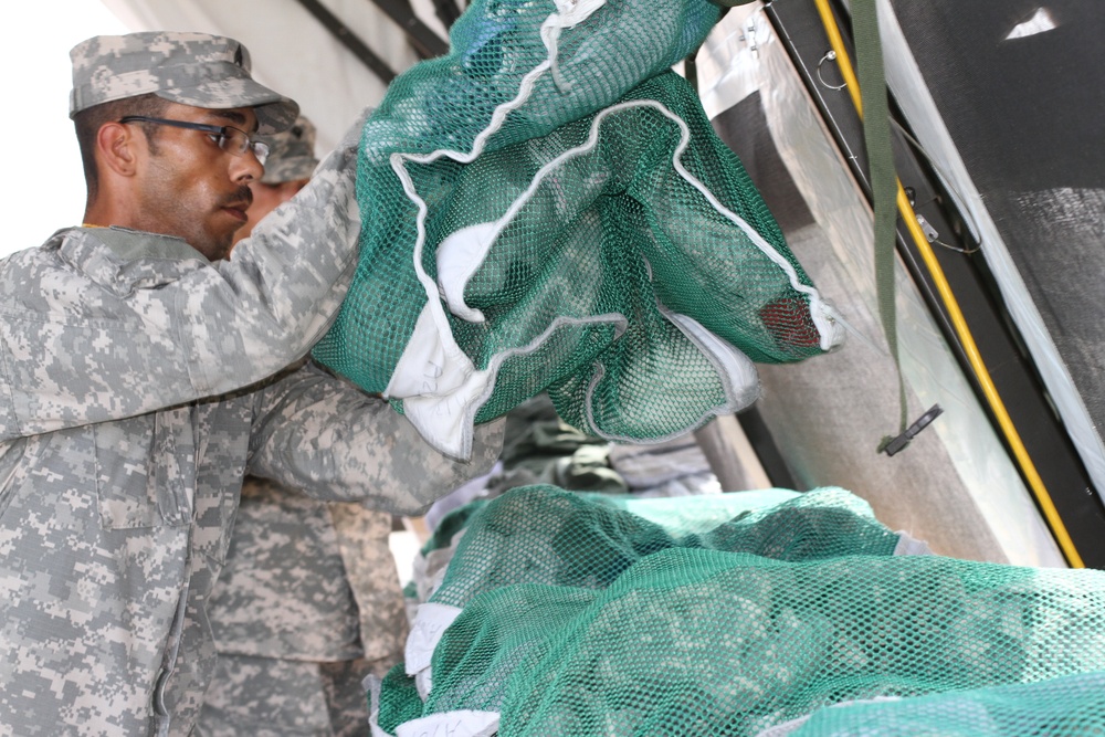 338th Quartermaster Field Services Company cleans soldiers’ clothes