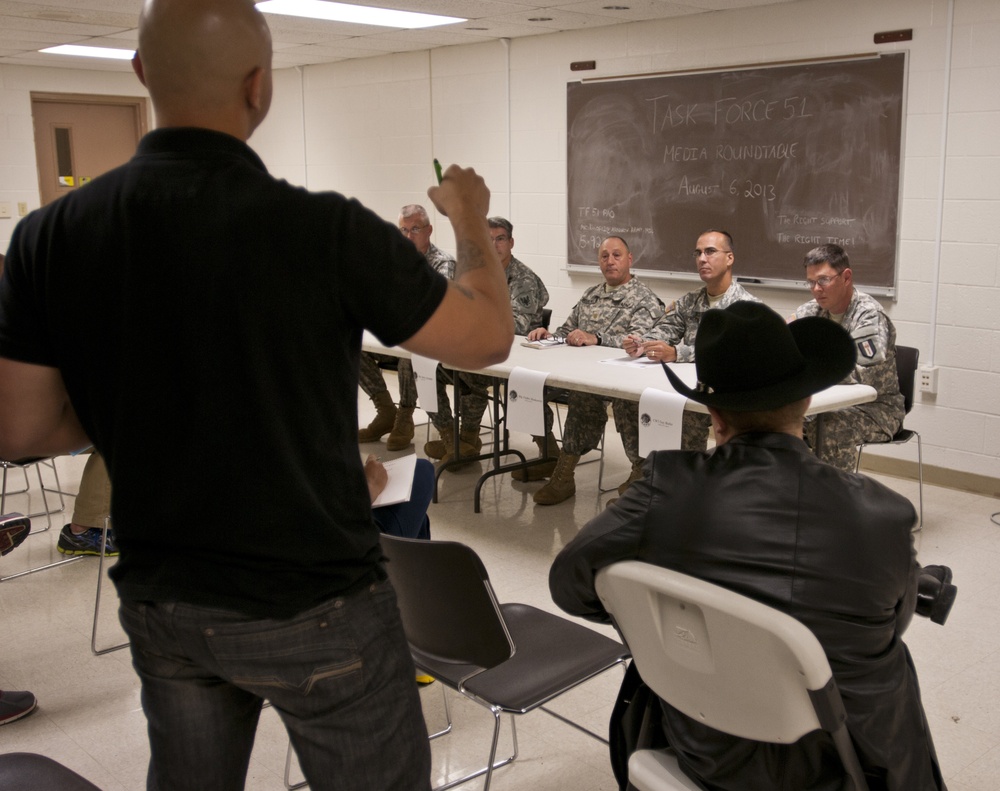 Military journalists grill subject matter experts during mock press conference at Vibrant Response 13-2