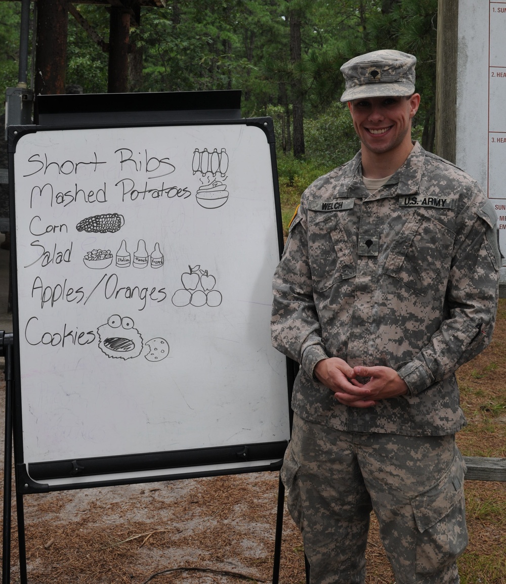 OSW soldier, food service specialist, with menu