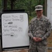 OSW soldier, food service specialist, with menu