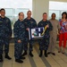 Surgeon general presents Blue 'H' flag to USNH Okinawa Health Promotion staff