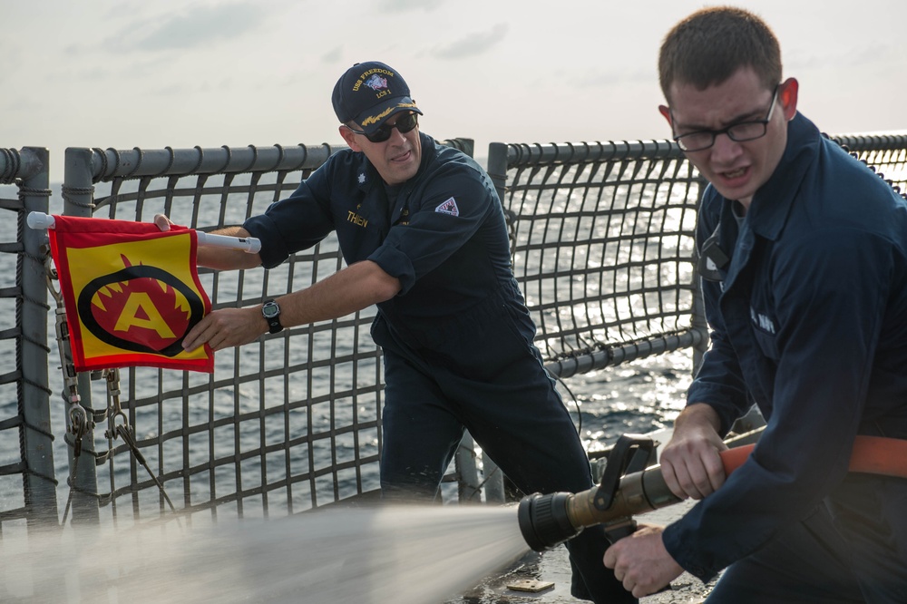 USS Freedom sailors train
