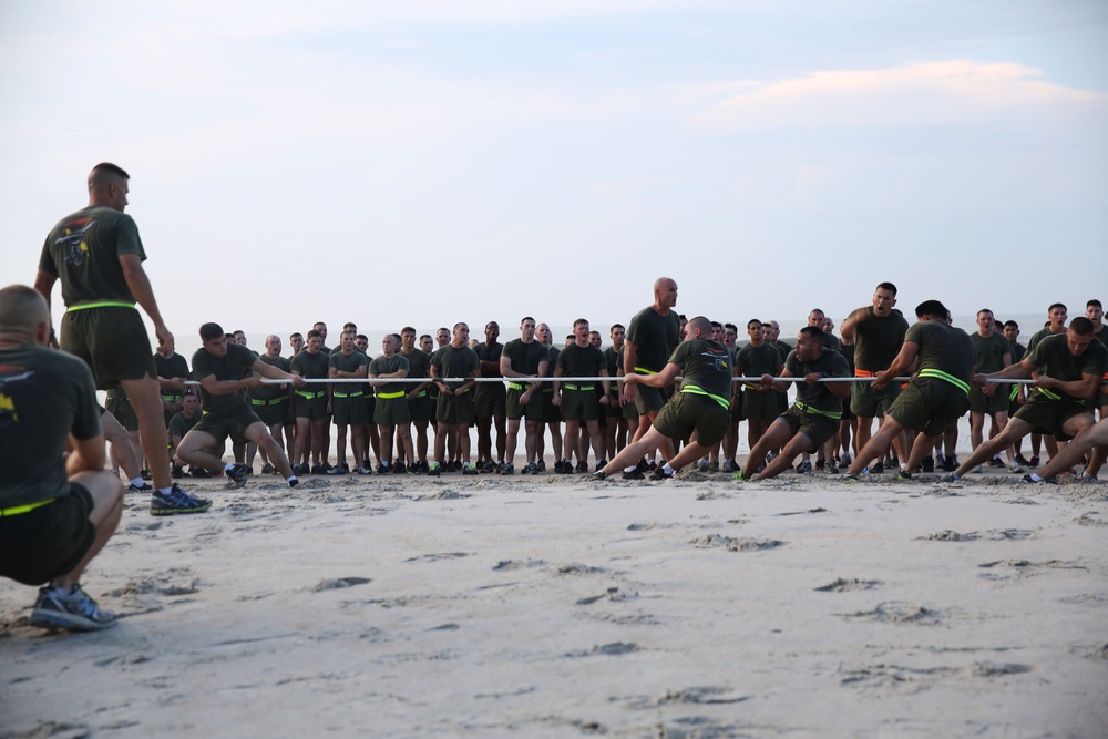 Storming the beach: 2nd Maintenance Battalion pounds sand for a little physical training