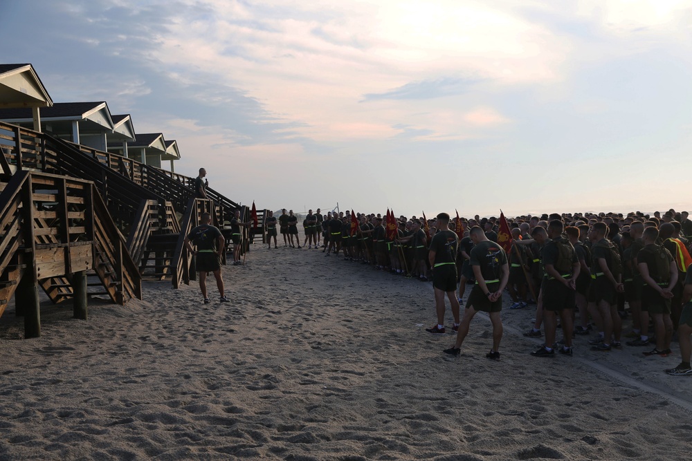 Storming the beach: 2nd Maintenance Battalion pounds sand for a little physical training