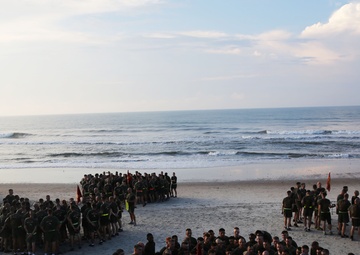 Storming the beach: 2nd Maintenance Battalion pounds sand for a little physical training