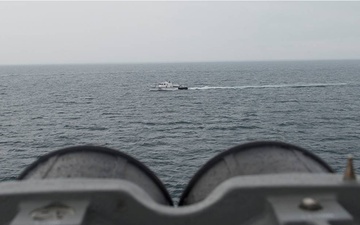 USS Bulkeley maneuvers With Georgia Coast Guard ship