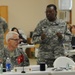 OSW Col. Junior speaks at a Commander's Update Brief