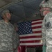 Re-enlistment by air: two soldiers re-enlist in the sky above Camp Atterbury