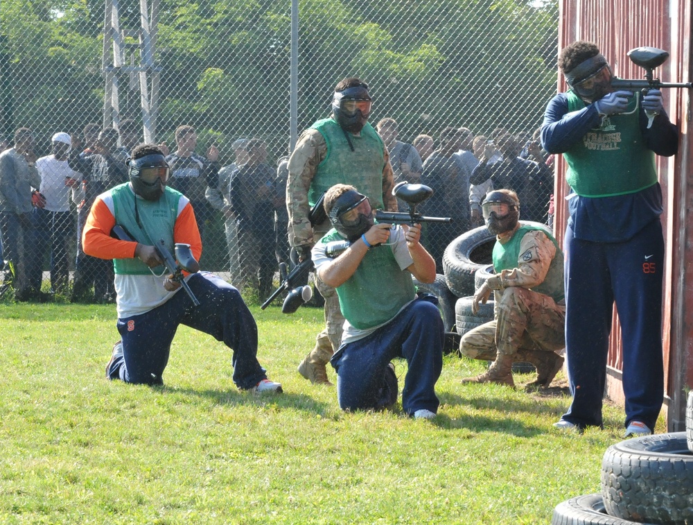 Spartan soldiers, Syracuse University football players battle in paintball competition