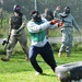 Spartan soldiers, Syracuse University football players battle in paintball competition