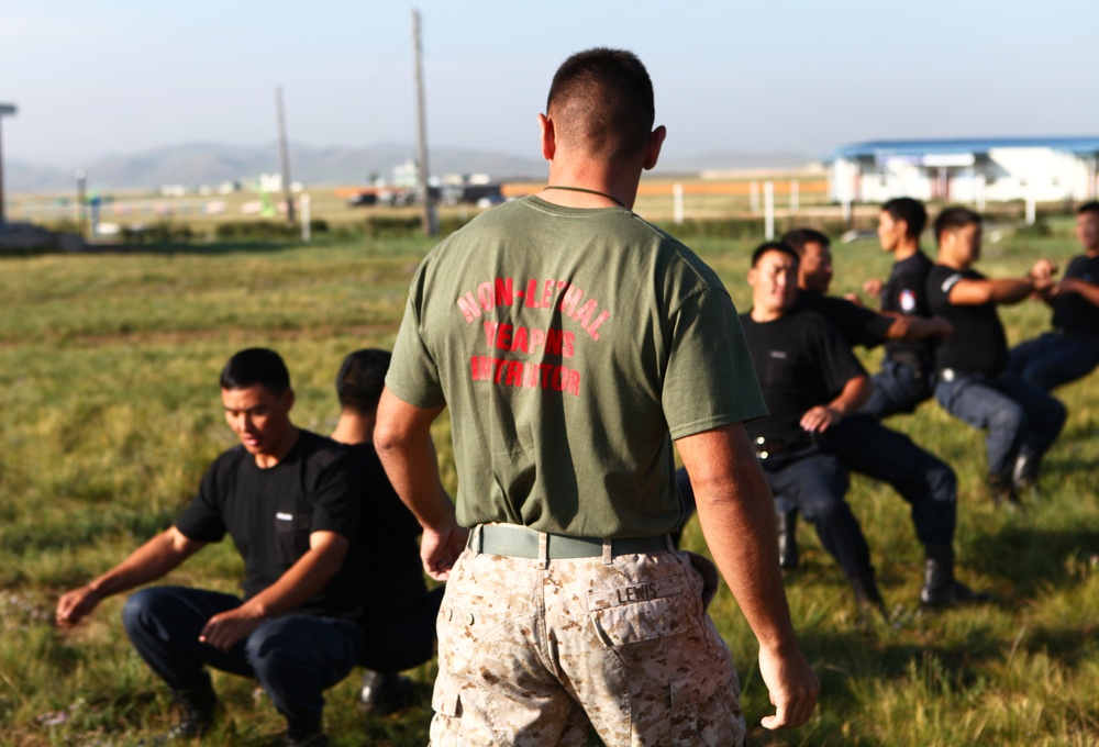 Marines train with Mongolian troops, police on control holds and non-lethal tactics