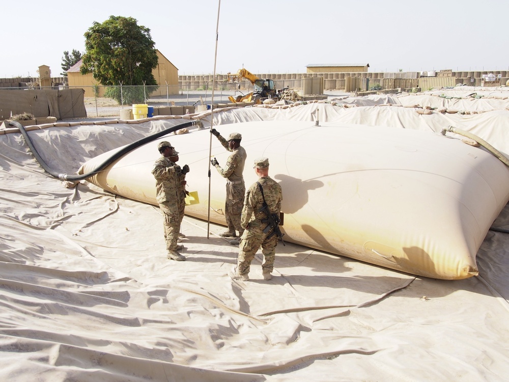 Soldiers in Dakota Troop, 6-4 CAV, conduct a physical inventory of fuel on FOB Kunduz