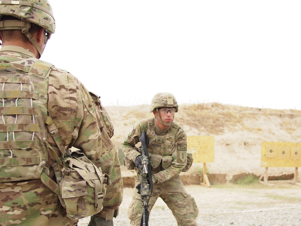 Sgt. 1st Class Richards evaluates his soldiers during short-range marksmanship training