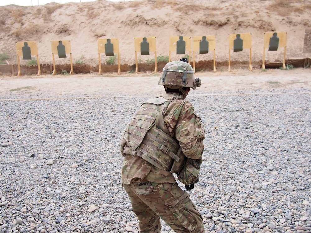 Pfc. Travers prepares to engage targets during short-range marksmanship training