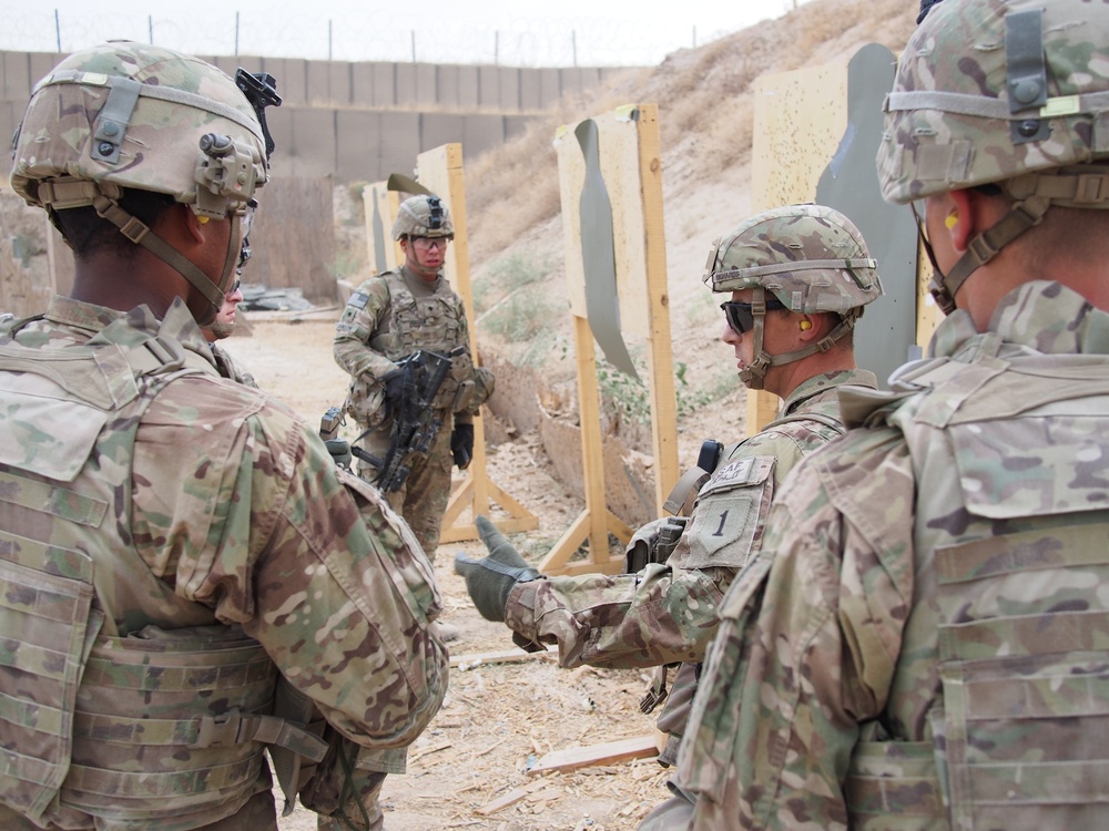 Sgt. 1st Class Richards provides instruction to his soldiers in short-range marksmanship on FOB Kunduz