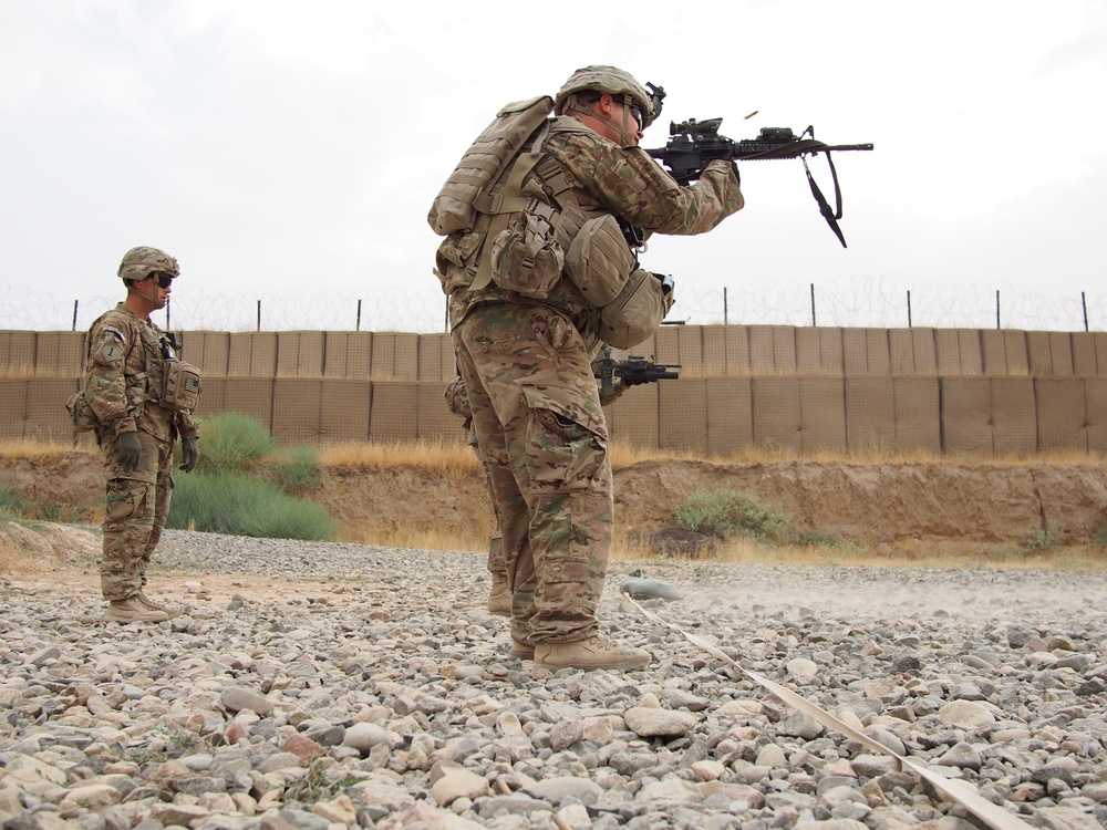 Sgt. 1st Class Richards observes his soldiers as they practice short-range marksmanship