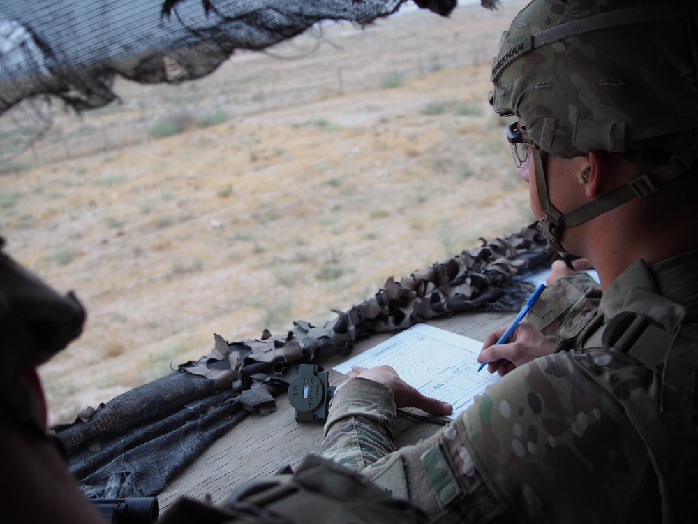 Pfc. Markham completes a range card as part of an individual skill competition