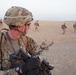 2nd Lt. Jenson checks his grid location while his platoon reconsolidates during a dismounted patrol outside of FOB Kunduz