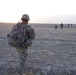 Sgt. 1st Class Richards surveys his platoon as they conduct a dismounted patrol outside of FOB Kunduz