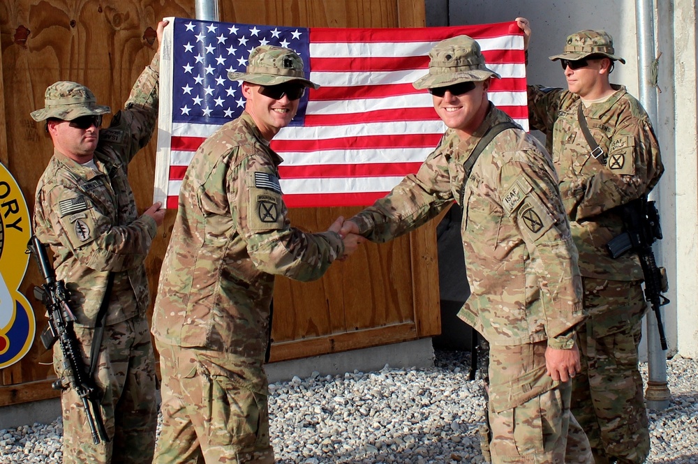 Spc. Christopher Ward re-enlists