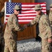 Spc. Christopher Ward re-enlists