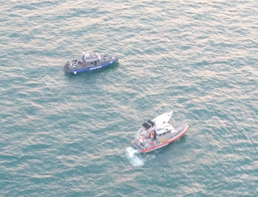 Coast Guard rescues 9 from sinking boat near Chicago