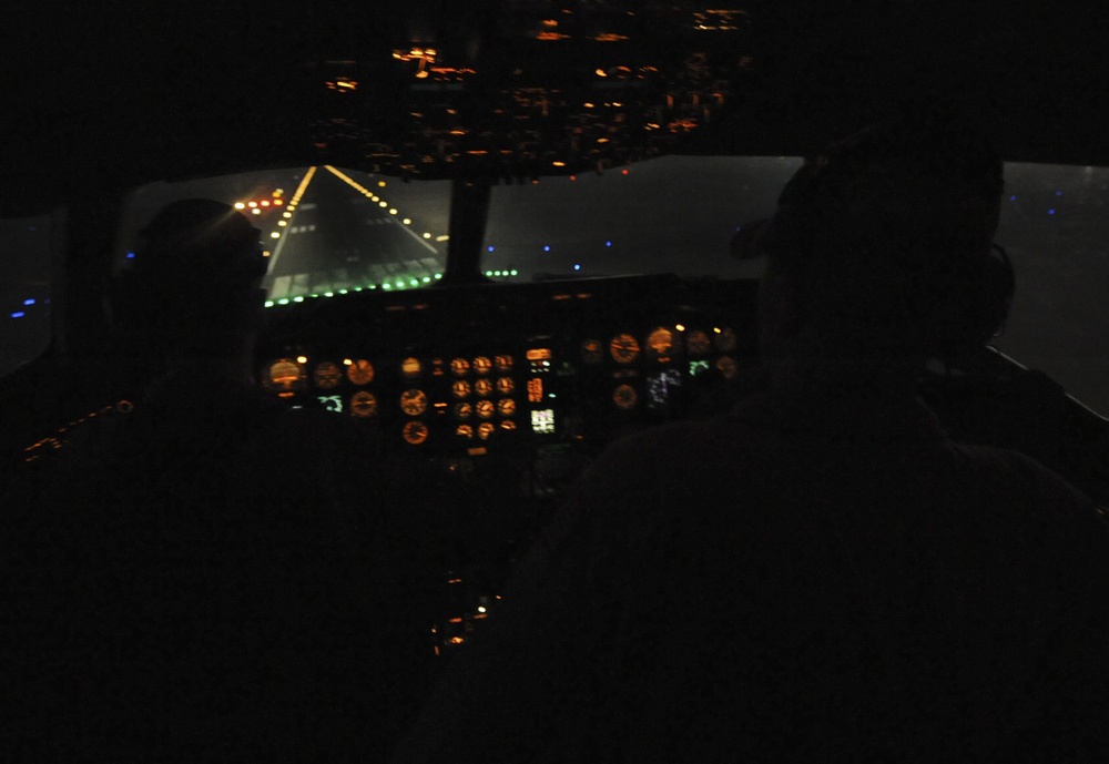 KC-10 landing at night