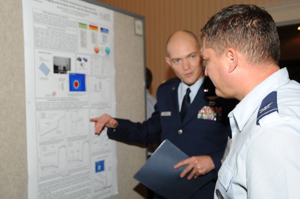 Briefing during a DTRA Basic Research Technical Review Poster Session