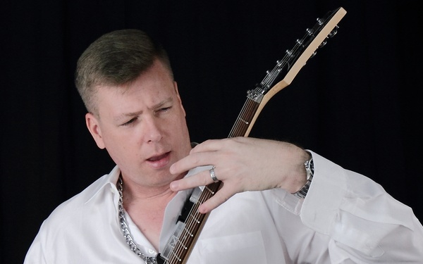 Guitar musical notes play into lifelong journey