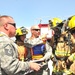 Firefighters engage in a HAZMAT emergency