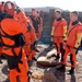Coast Guard members conduct survival swim training