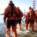 Coast Guard members conduct survival swim training