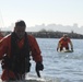 Coast Guard members conduct survival swim training