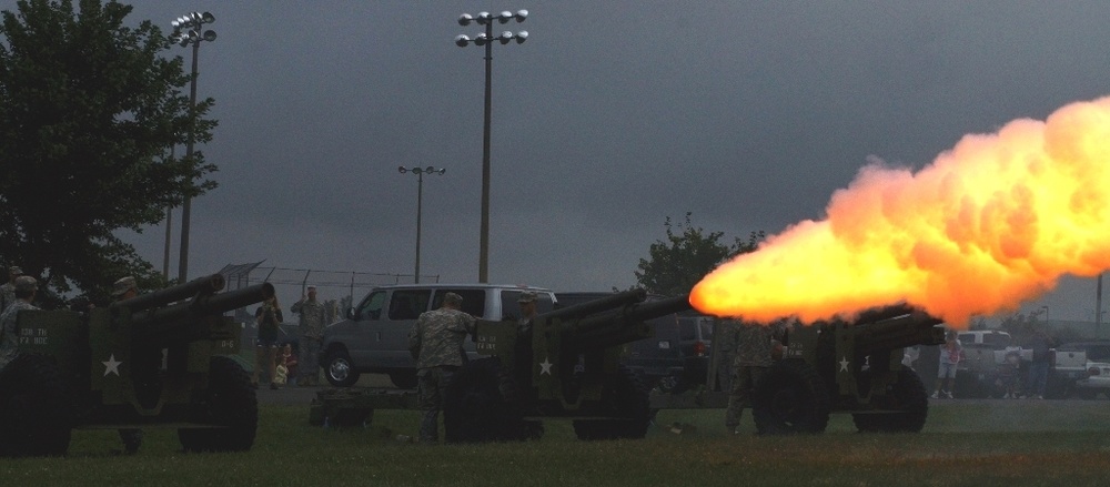A cannon fires its salute to honor America's fallen heroes