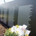 A vase of flowers pays tribute to those lost in the Vietnam War