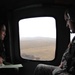 A Japanese major general gets an aerial tour of the Yakima Training Center