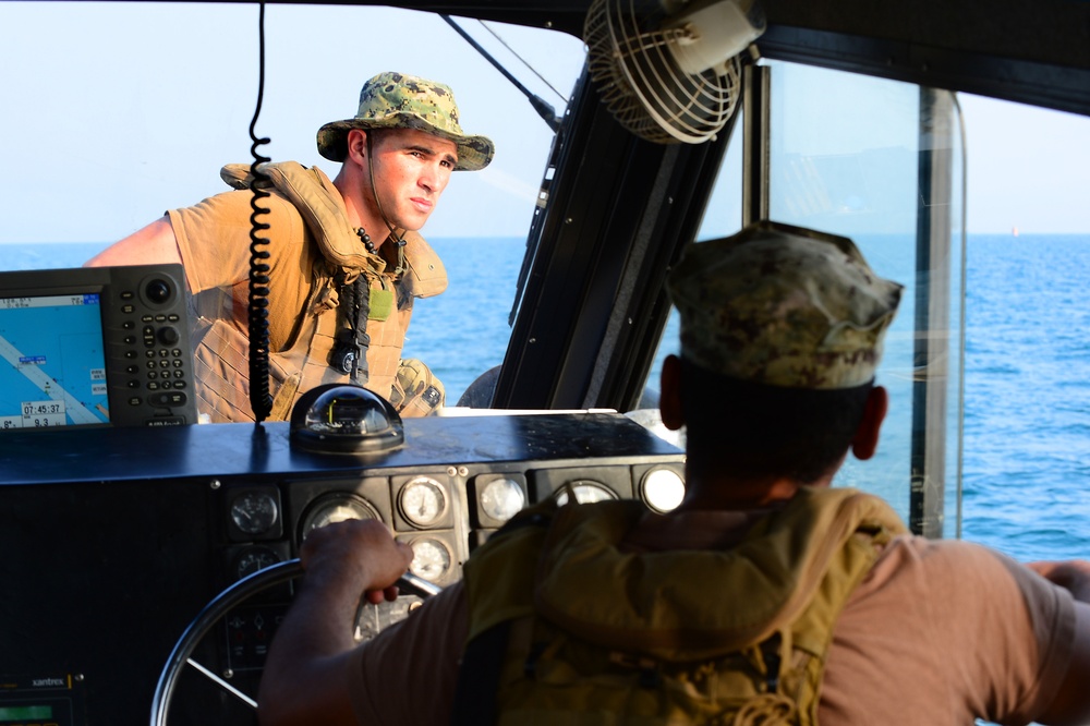 Commander, Task Group (CTG) 56.7 security boat escort