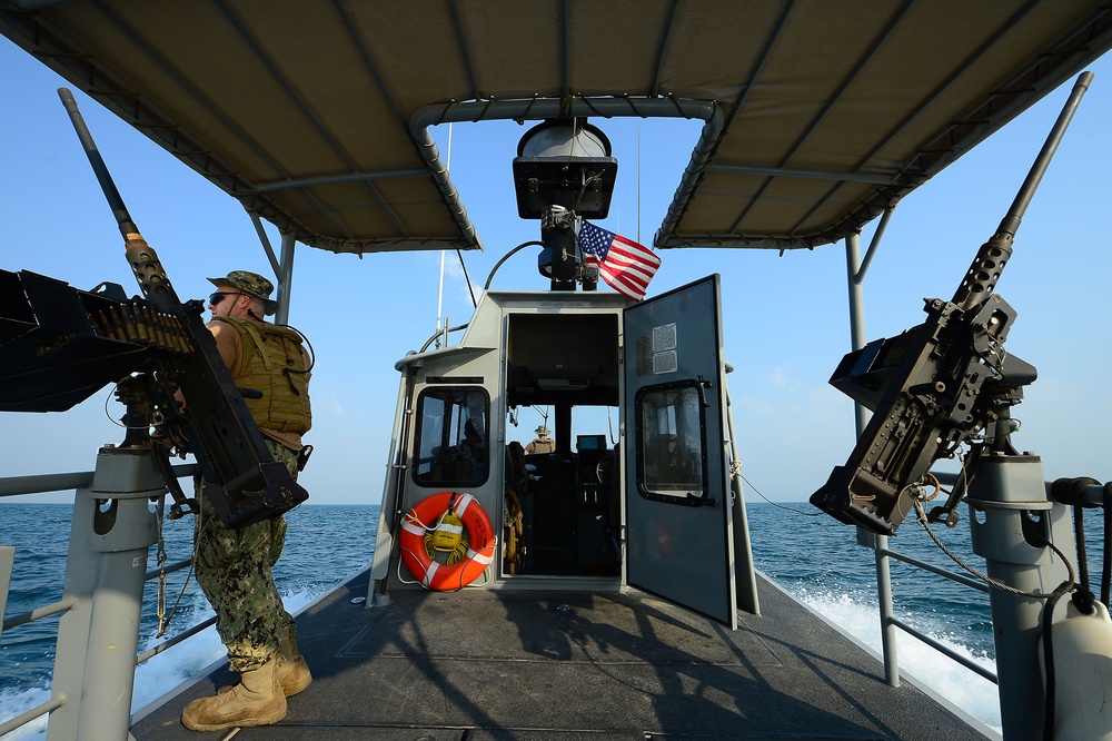 Commander, Task Group (CTG) 56.7 security boat escort