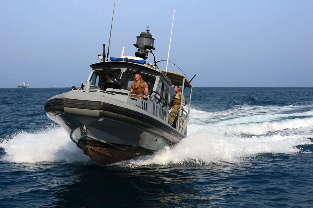 Commander, Task Group (CTG) 56.7 security boat escort