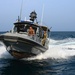 Commander, Task Group (CTG) 56.7 security boat escort