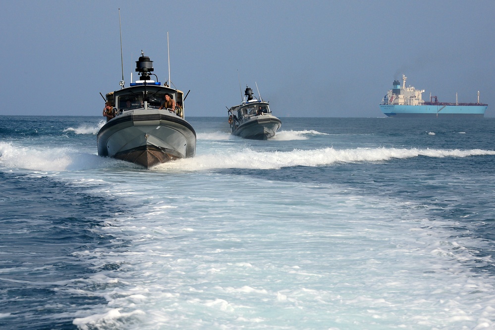 Commander, Task Group (CTG) 56.7 security boat escort