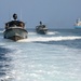 Commander, Task Group (CTG) 56.7 security boat escort