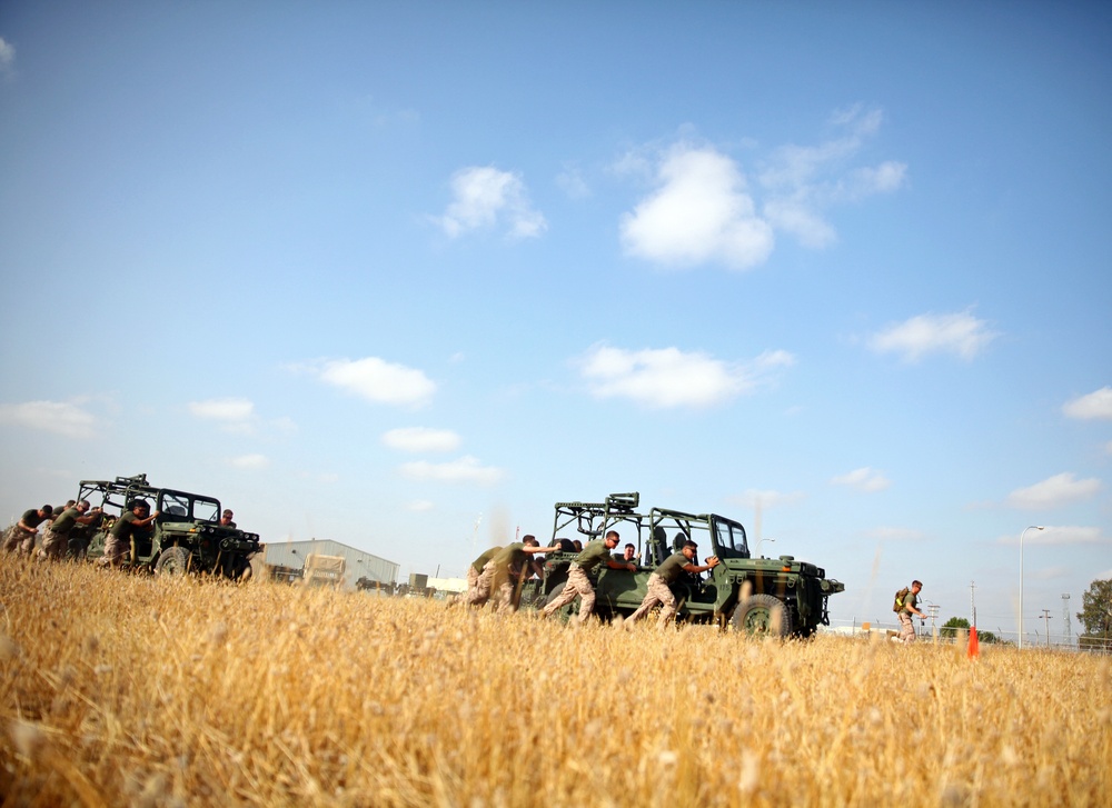 SP-MAGTF Crisis Response Marines take part in a squad-based physical training competition