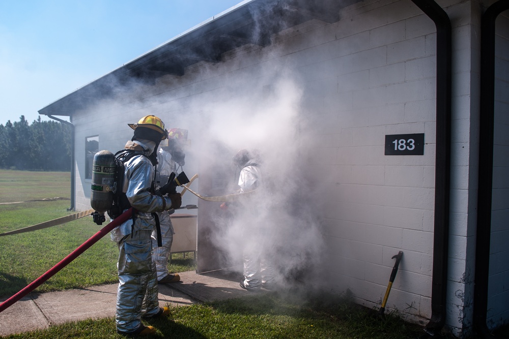Firefighters respond to simulated structure fire