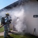 Firefighters respond to simulated structure fire